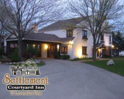 Logo for Settlement Courtyard Inn & Lavender Spa Logo for Settlement Courtyard Inn & Lavender Spa