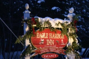 Eagle Harbor Inn sign in snow